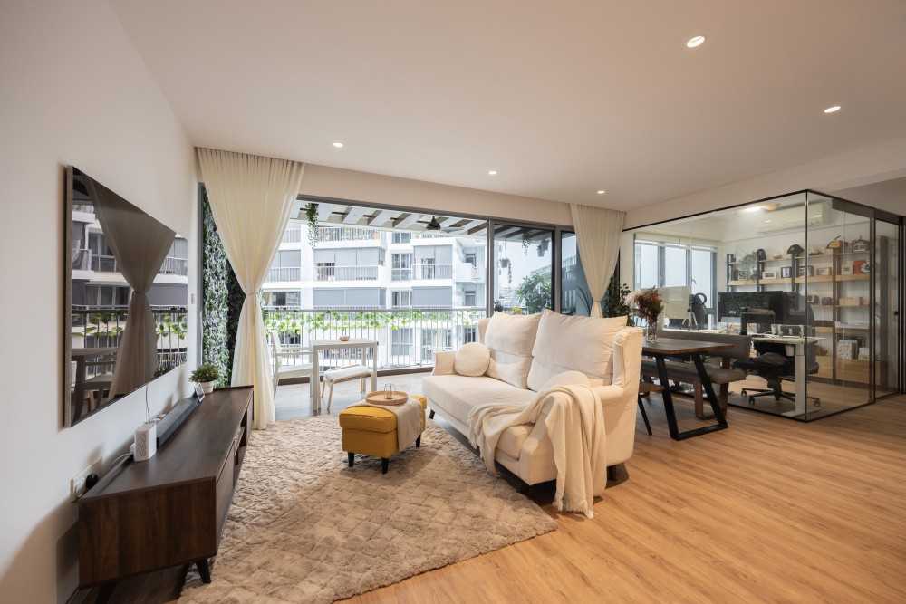 scandinavian living room with tv console and glass door