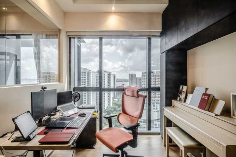 contemporary study with bookshelf and desk