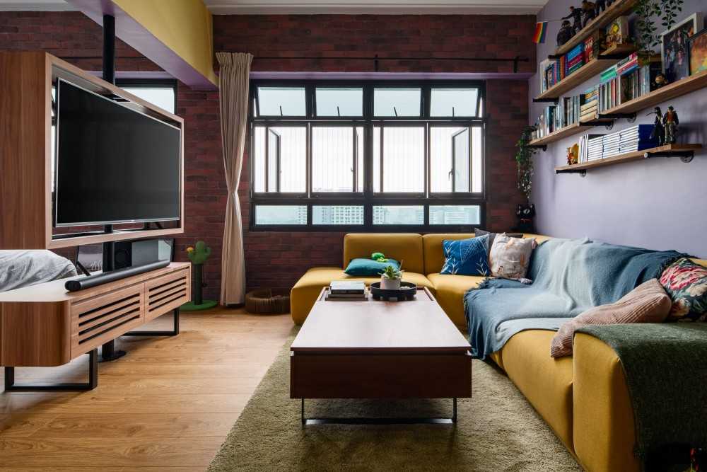 eclectic living room with tv console and feature wall