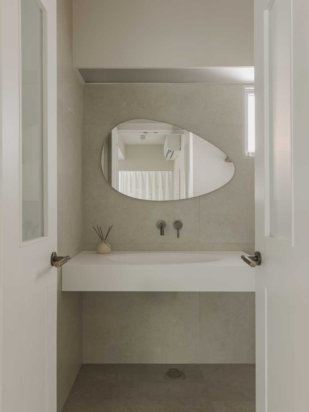 minimalist bathroom with mirror and bathroom mirrors