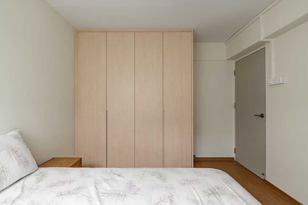 scandinavian bedroom with vinyl flooring and wardrobe
