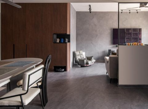 industrial living room with homogeneous tiles and feature wall