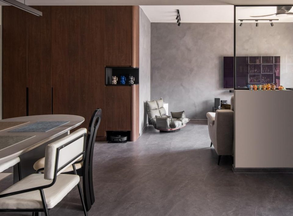 industrial living room with homogeneous tiles and feature wall