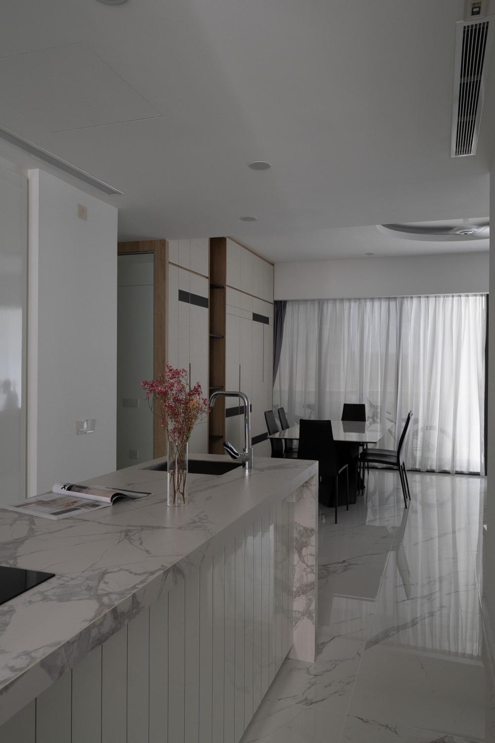modern kitchen with marble floor and kitchen island