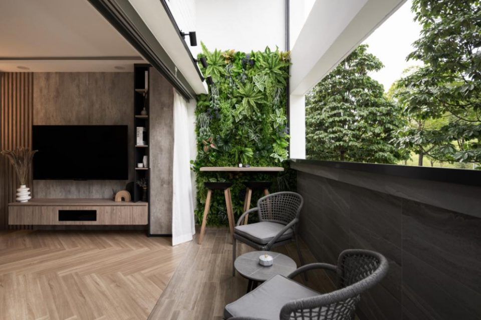 scandinavian balcony with window seat and outdoor table