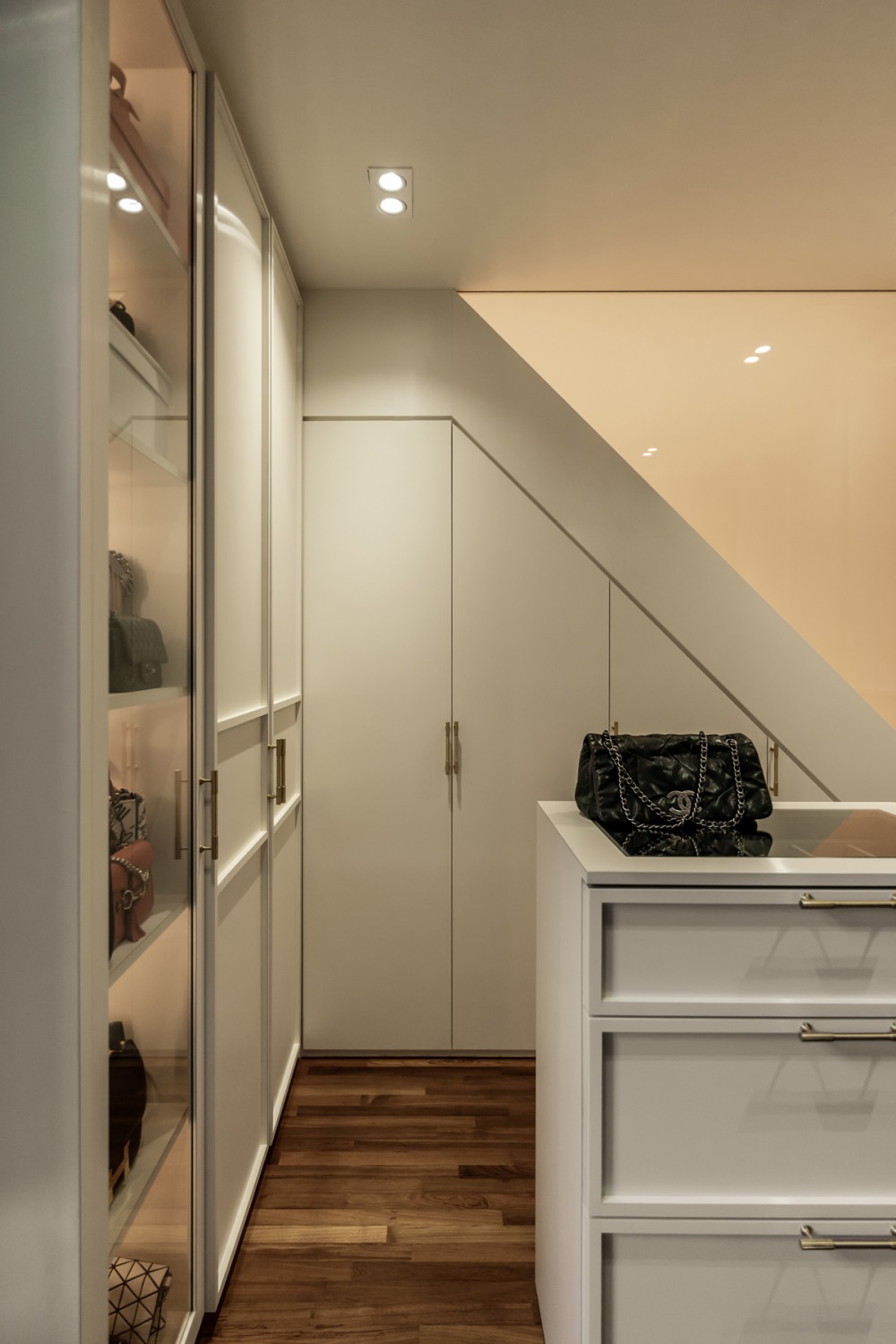 contemporary walk in wardrobe with wardrobe and downlights
