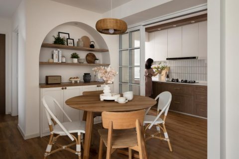 contemporary dining room with dining table and display cabinets