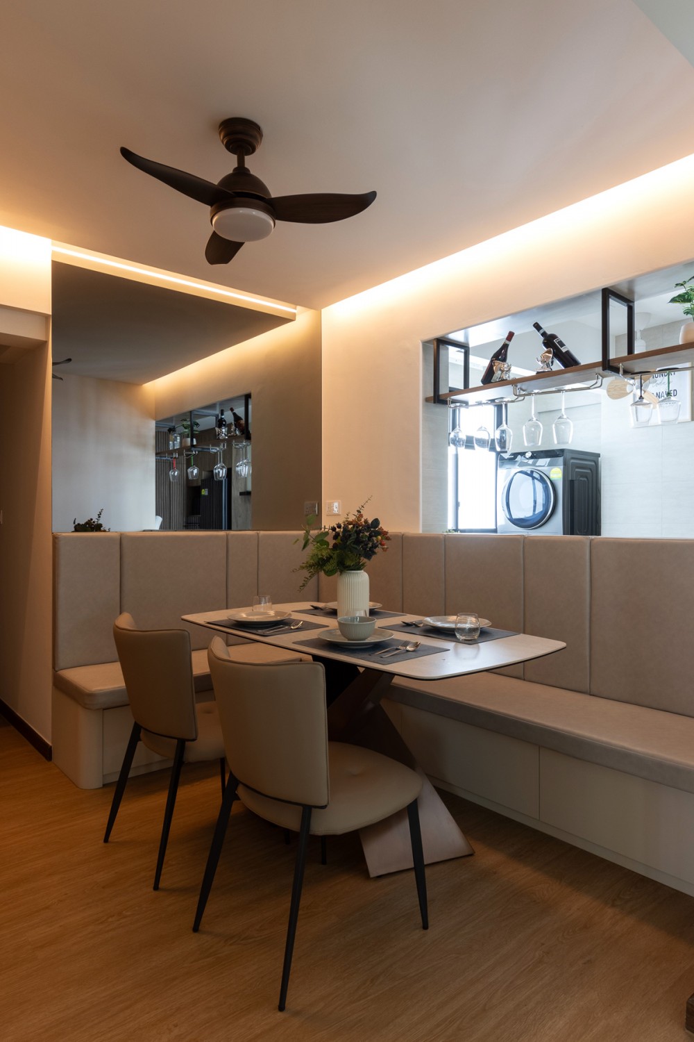 contemporary dining room with vinyl flooring and mirror