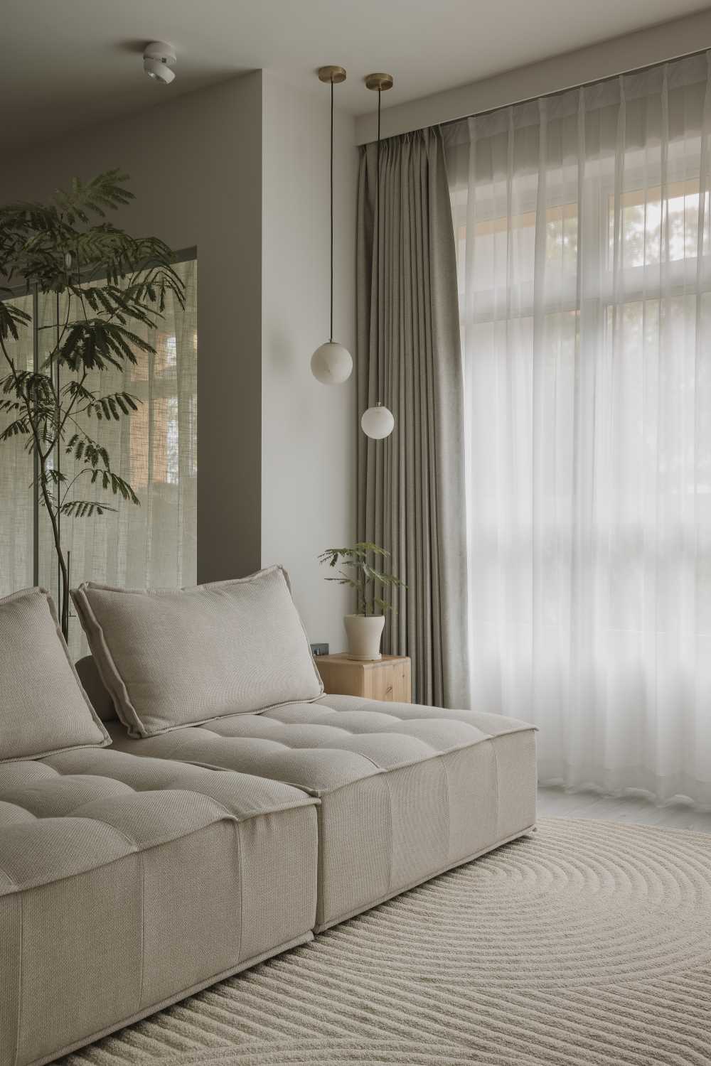 minimalist bedroom with curtains and storage bed