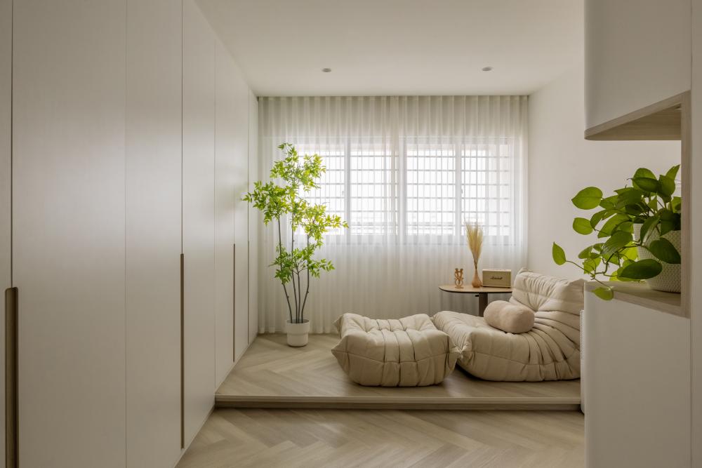 minimalist living room with bookshelf and sofa