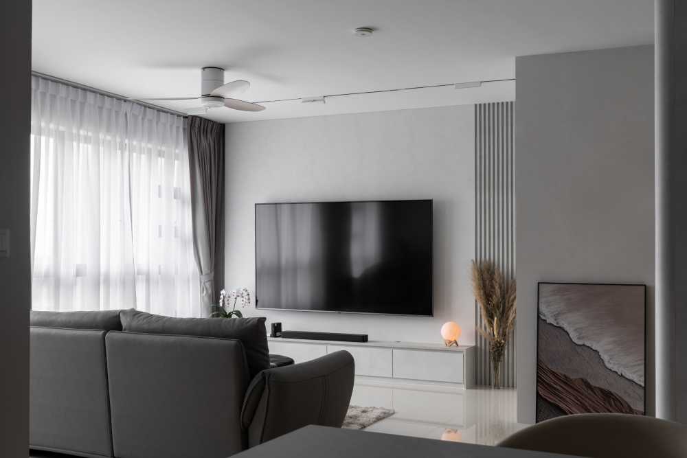 minimalist living room with bookshelf and vinyl flooring