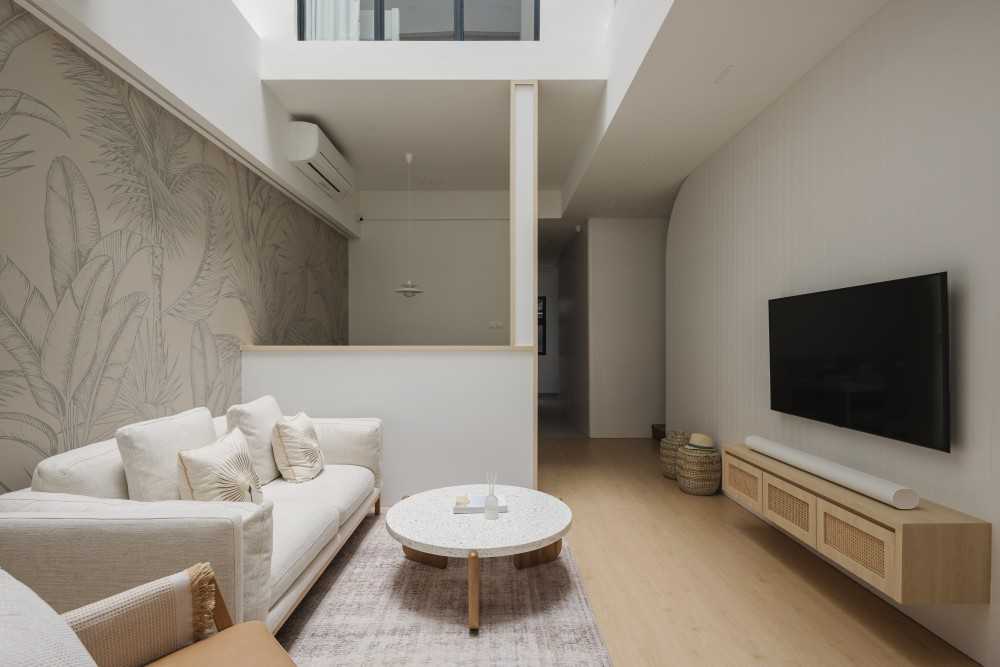 minimalist living room with console table and vinyl flooring 2