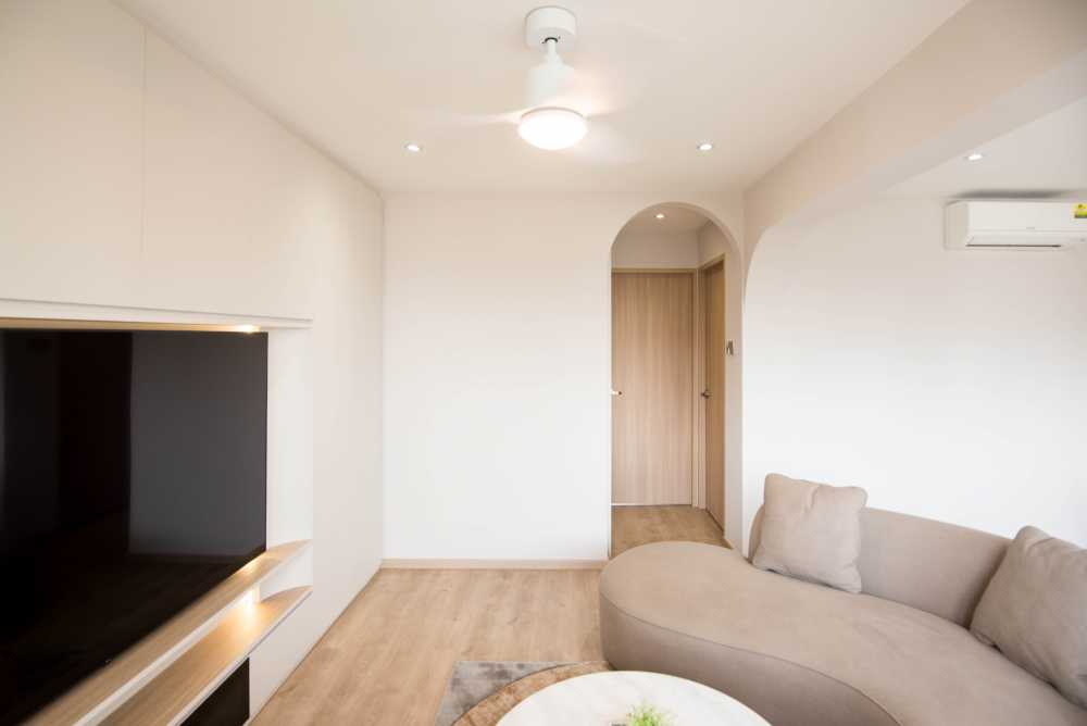 minimalist living room with vinyl flooring and tv console