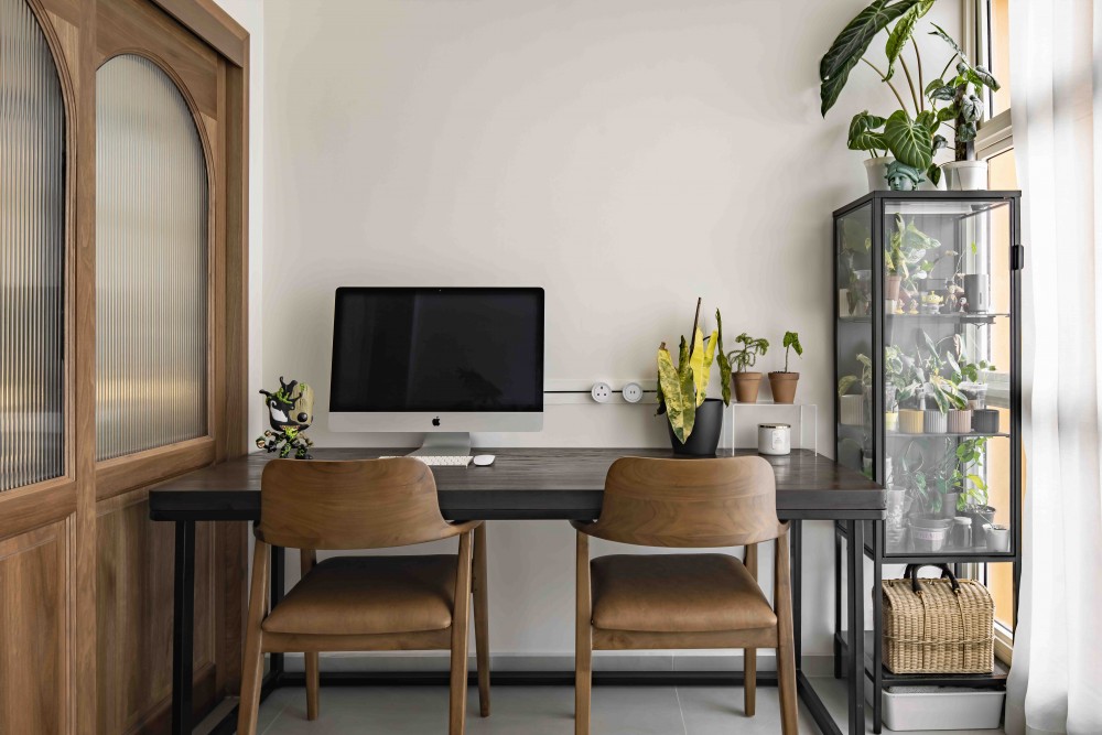 modern study with desk and desk chairs