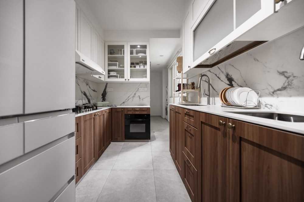 scandinavian kitchen with countertop and homogeneous tiles