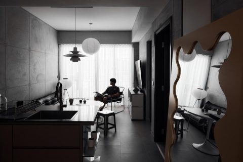 industrial living room with cement floor and sofa