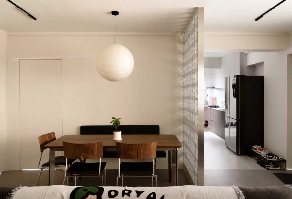 minimalist dining room with feature wall and dining table