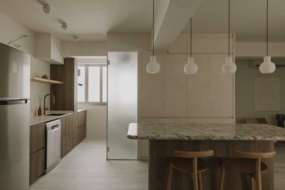 minimalist kitchen with kitchen island and cupboard