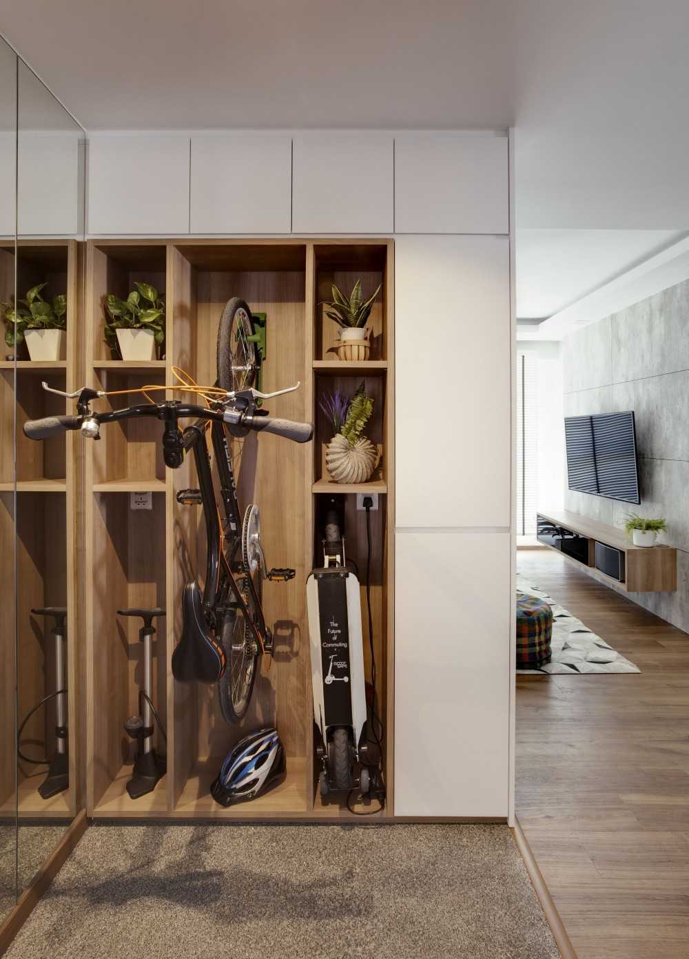 scandinavian entryway with mirror and open storage