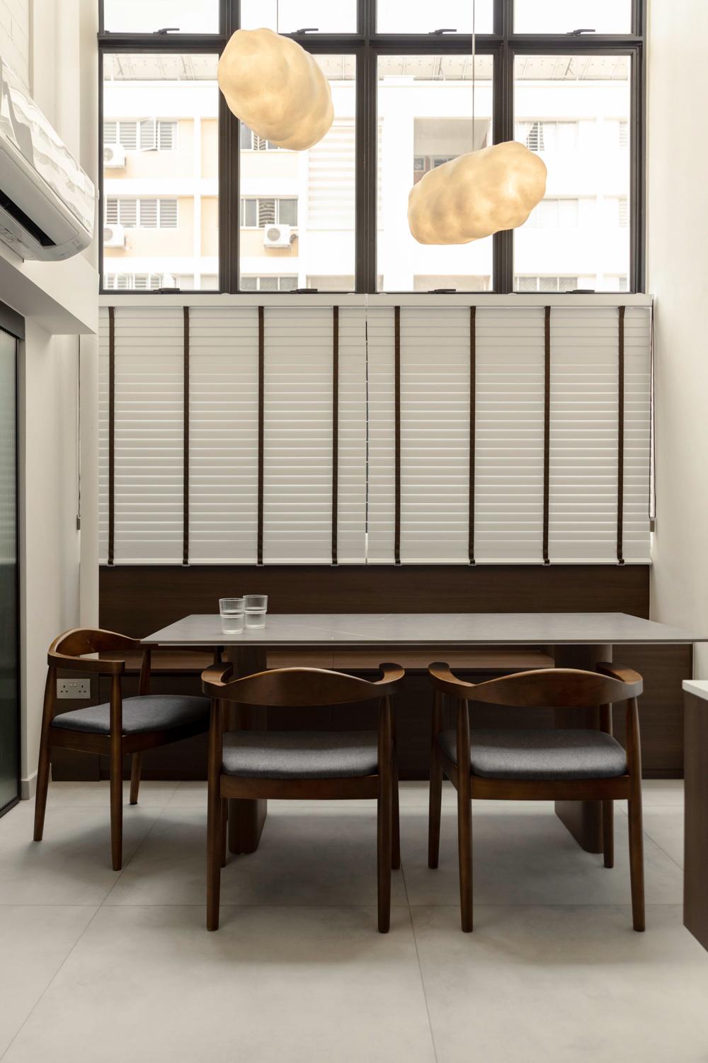 minimalist dining room with dining table and dining chairs