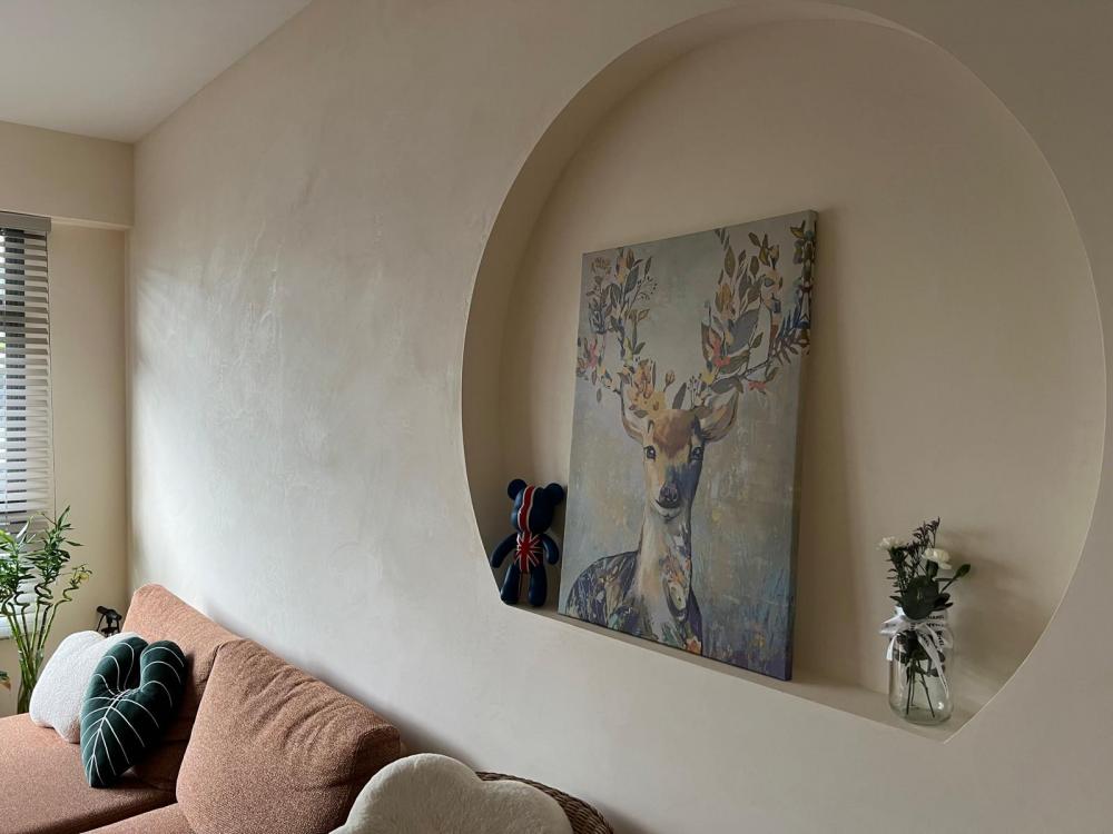 scandinavian living room with feature wall and sofa