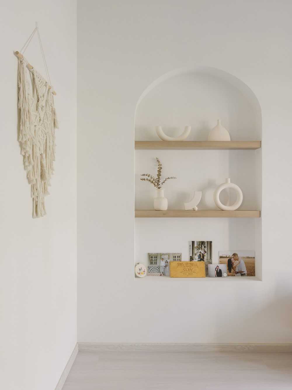 scandinavian living room with display cabinets and open storage