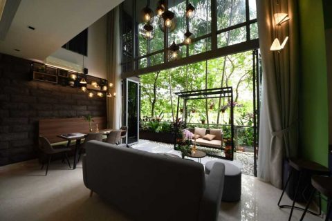 contemporary living room with settee and marble floor