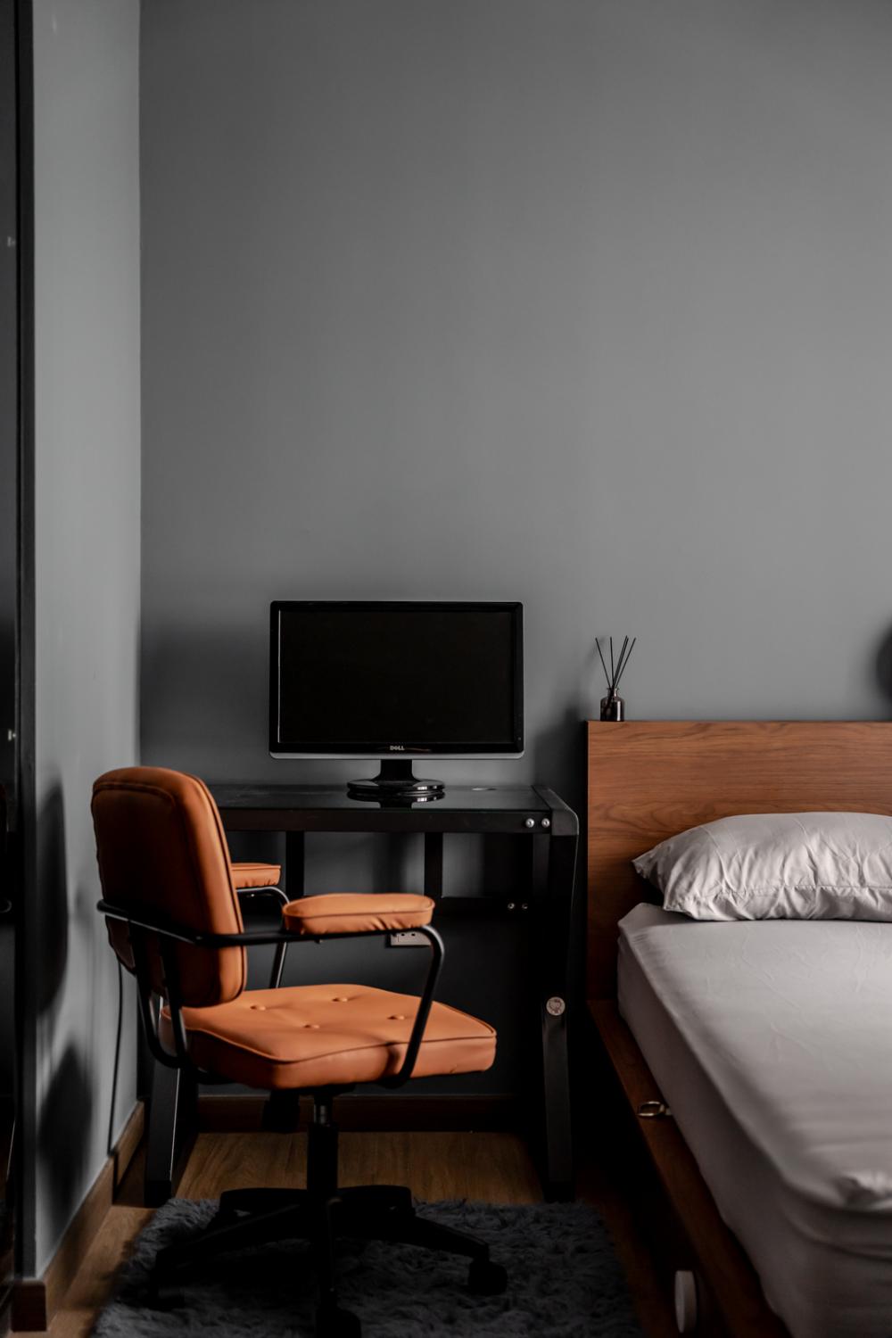 industrial bedroom with vinyl flooring and desk