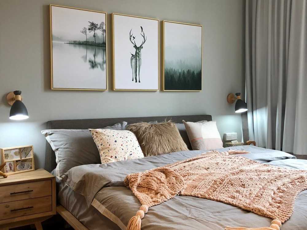 scandinavian bedroom with parquet floor and bedside table