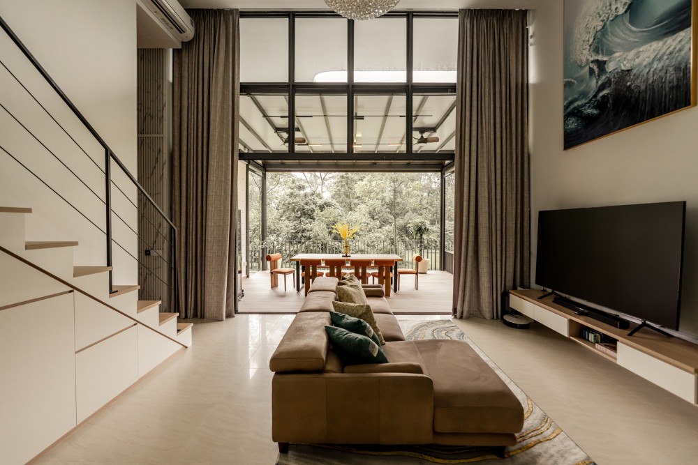 contemporary living room with tv console and staircase