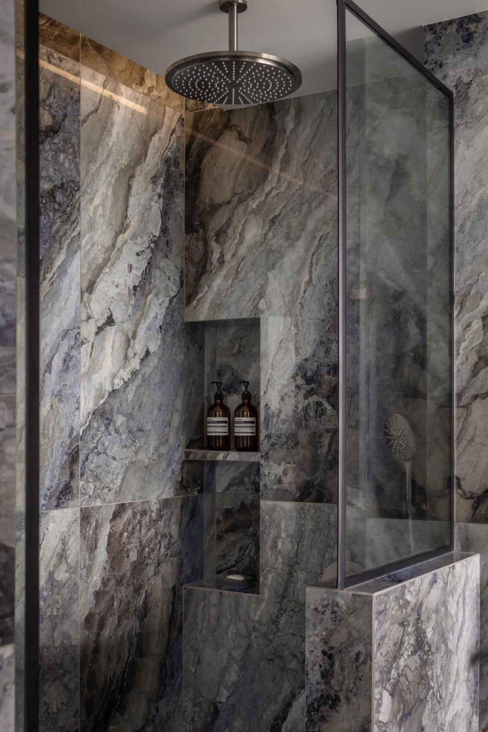 eclectic bathroom with shower screen and rainshower