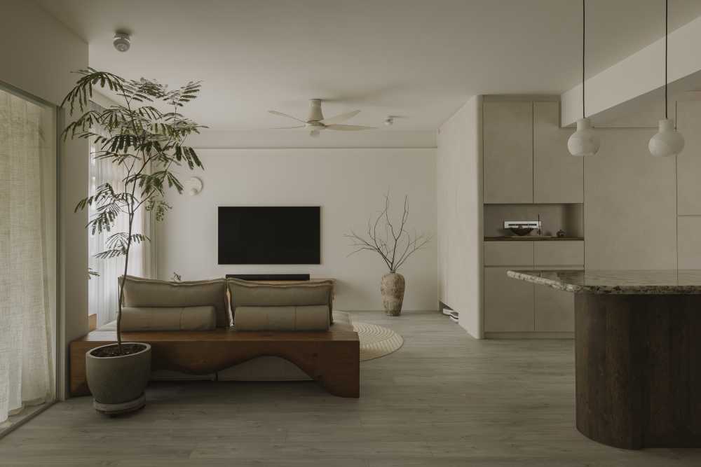 minimalist living room with countertop and carpet