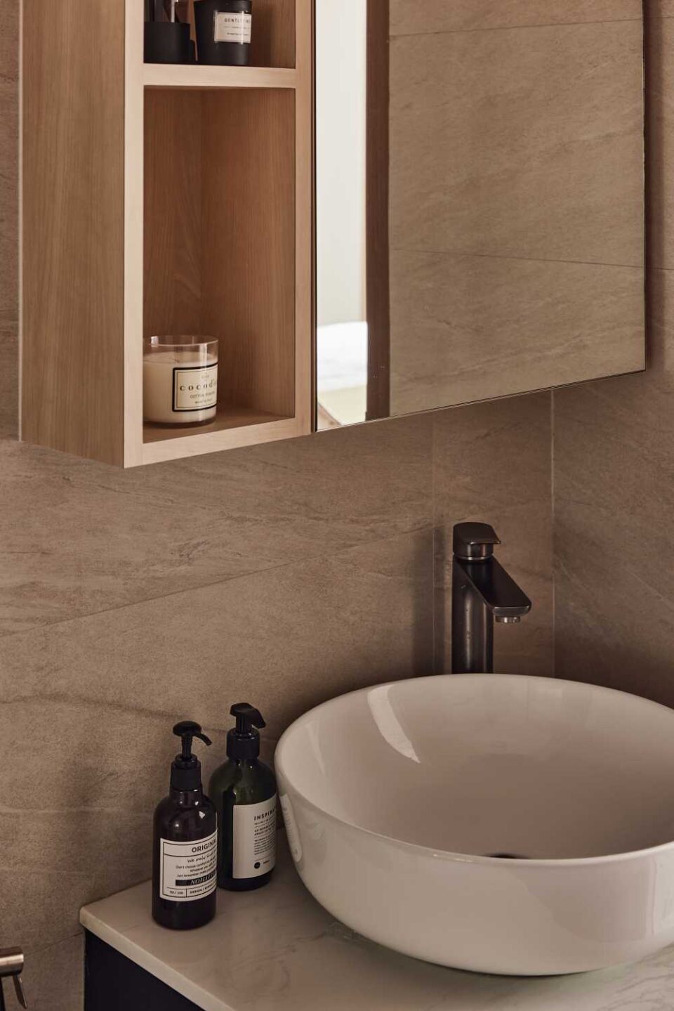 scandinavian bathroom with countertop and mirror