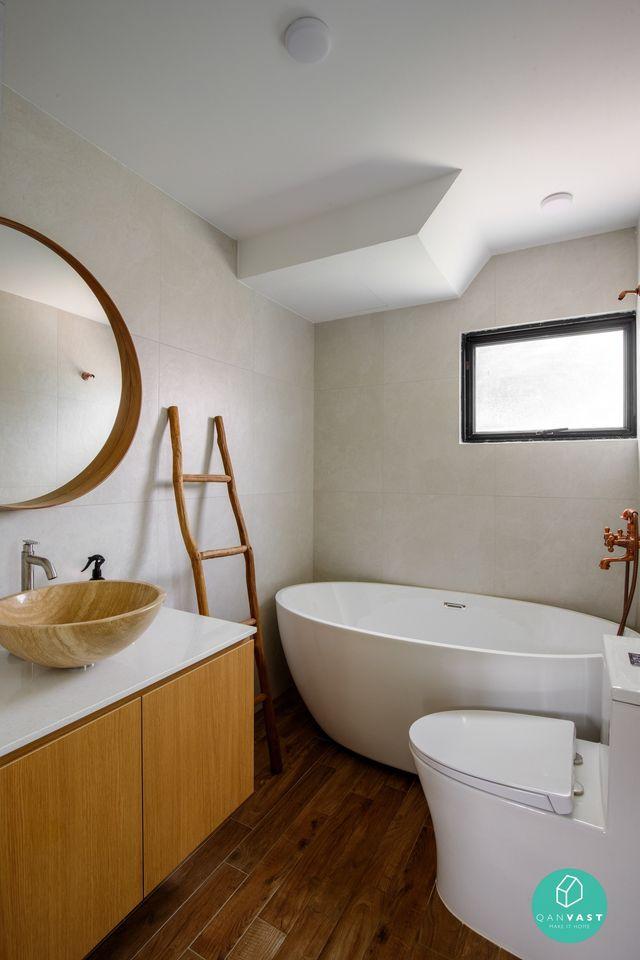 transitional bathroom with bathtub and bathroom storage