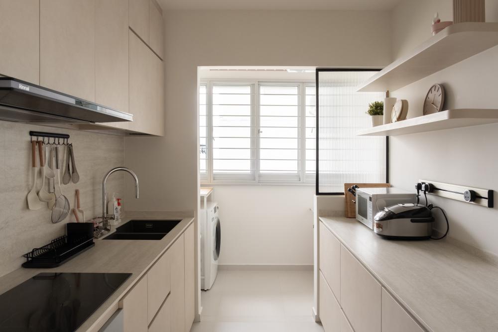 modern kitchen with countertop and homogeneous tiles