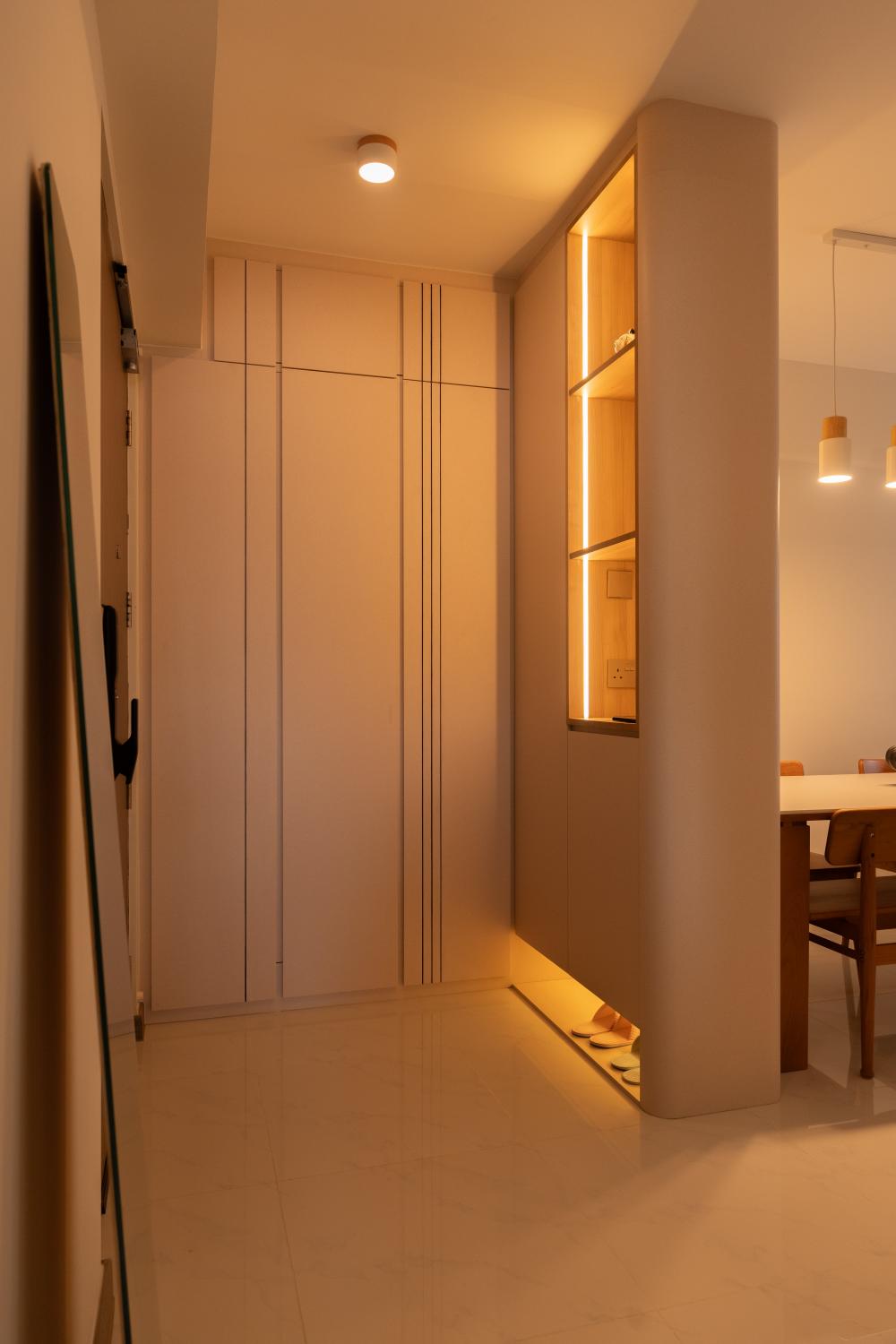 minimalist entryway with seating bench and shoe rack