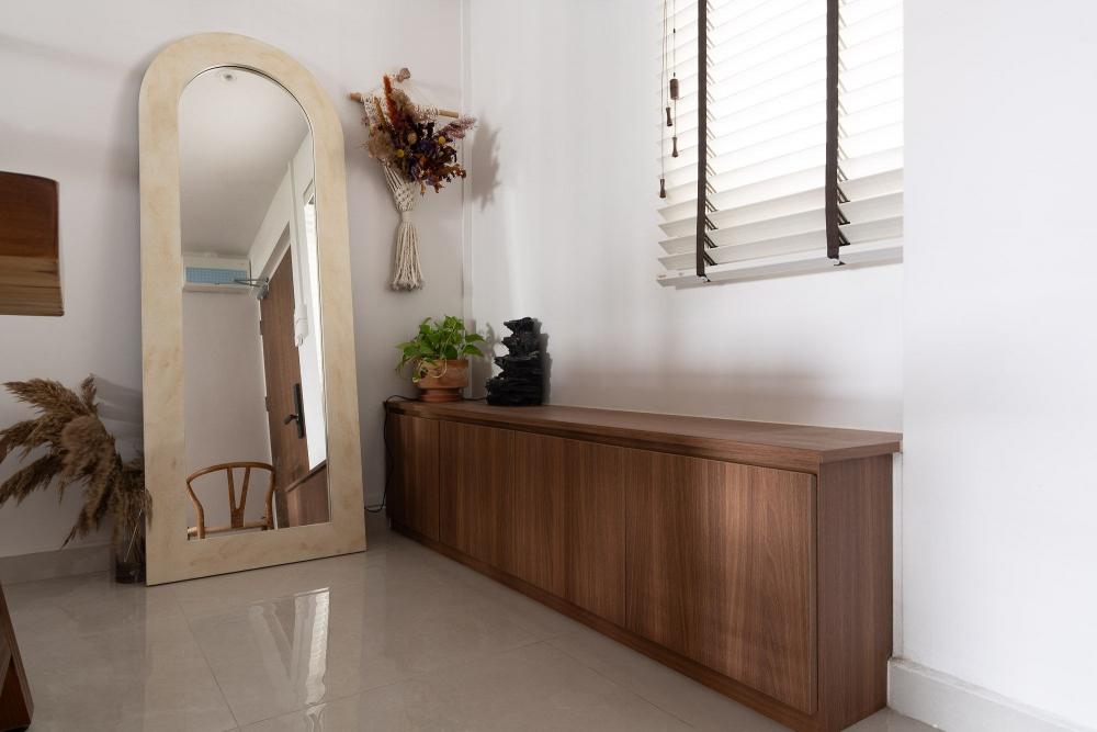 modern entryway with mirror and shoe cabinets