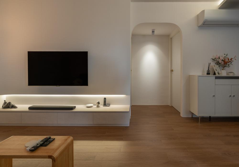 modern living room with parquet floor and tv console