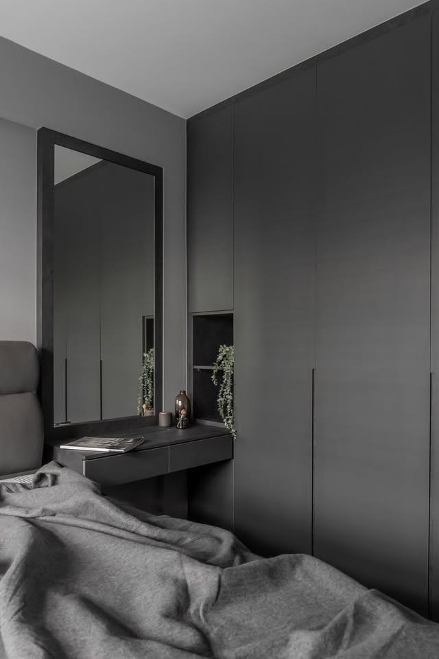 contemporary bedroom with wardrobe and bedside table