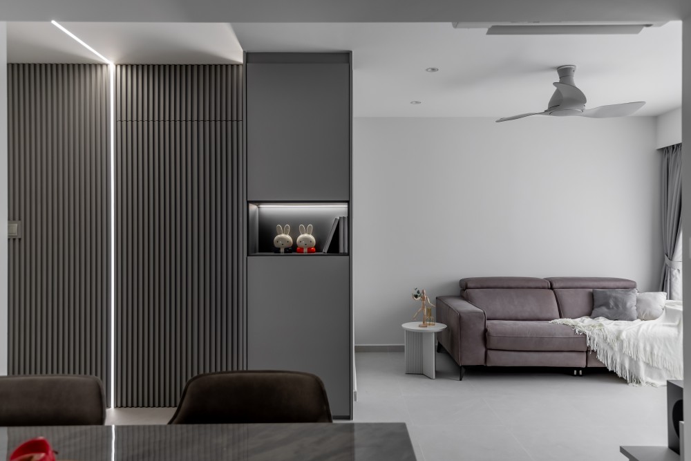 minimalist living room with homogeneous tiles and feature wall